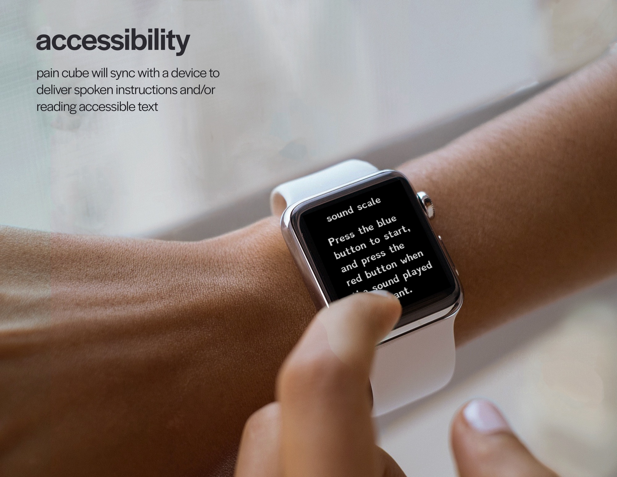 Accessibility board: the cube syncing to a watch for spoken instructions.
